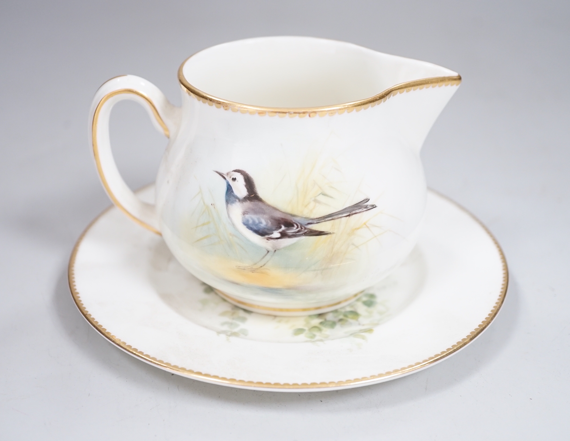 A Royal Worcester titled bird part tea set painted by W Powell